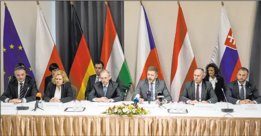  ?? Darko Vojinovic The Associated Press ?? Interior ministers of, from left, Poland, Bartosz Grodecki; Germany, Nancy Faeser; Hungary, Sandor Pinter; Czech Republic, Vit Rakusan; Austria, Gerhard Karner; and Slovakia, Matus Sutaj Estok, attend a news conference Monday in Szeged, Hungary.