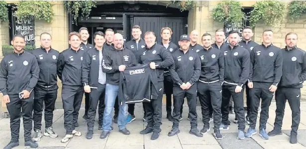  ??  ?? ●●Wardle Sunday League Football Club have been kitted out for those cold winter mornings thanks to Paul Whitham of Empire Rochdale, who has sponsored the purchase of tracksuits for the squad. Club spokesman John O’Donovan said: “It is a huge help when...