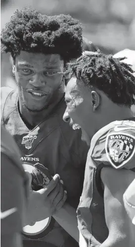  ?? WILFREDO LEE/AP ?? Through one regular-season game, Ravens quarterbac­k Lamar Jackson, left, and rookie wide receiver Marquise Brown have clicked.