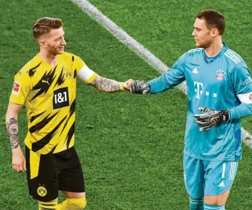  ?? Foto: Martin Meissner, dpa ?? Marco Reus und Manuel Neuer verstehen sich gut. Das ist begrüßensw­ert. Ein wenig jener Galligkeit, die jahrelang das Duell zwi‰ schen Bayern und Dortmund prägte, wäre aber auch ganz schön.