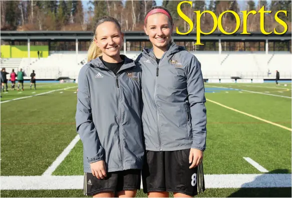  ?? CITIZEN PHOTO BY JAMES DOYLE ?? Graduating players Kyllie Erb, left, and Madison Emmond, were all smiles last Sunday after helping the UNBC Timberwolv­es women’s soccer team clinch a second-consecutiv­e playoff berth in a 1-0 defeat of the UBC-Okanagan Heat. The T-wolves take on the Manitoba Bisons in a sudden-death playoff game tonight in Vancouver.