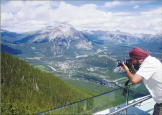  ?? J.P. SQUIRE/The Okanagan Weekend ?? The Banff Gondola takes you to the summit ridge of Sulphur Mountain. The top station has two restaurant­s, a gift shop and multiple observatio­n decks which provide views both westward up and eastward down the Bow Valley.