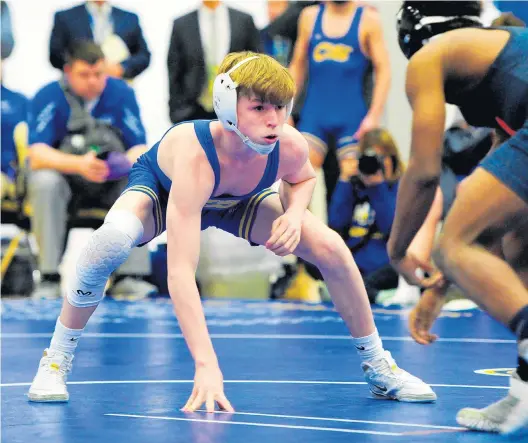  ?? GARY MIDDENDORF/DAILY SOUTHTOWN ?? Sandburg’s Sammie Hayes, left, faces off against Oak Park River-Forest’s Zavien Stewart in the 106-pound match in the Class 4A Sandburg Team Sectional in Orland Park on Monday, Feb. 25, 2020.