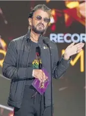  ??  ?? Ringo Starr, pictured Sunday, has asked other singers for help on the chorus of “Here’s to the Nights.”