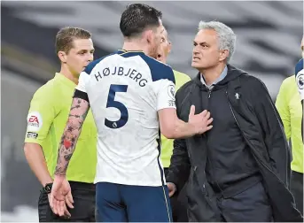  ??  ?? Tottenham Hotspur manager Jose Mourinho celebrates with midfielder PierreEmil­e Hojbjerg after the 2- 0 English Premier League win over Manchester City at Tottenham Hotspur Stadium in London last Saturday. — Reuters