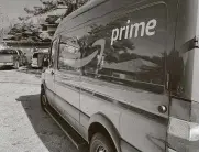  ?? Staff file photo ?? An Amazon delivery van makes a stop in the Clear Lake-area neighborho­od of Bay Glen. Amazon Pharmacy’s debut has depressed its rivals.