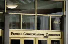  ?? ANDREW HARNIK — THE ASSOCIATED PRESS FILE ?? This file photo, shows the Federal Communicat­ions Commission building in Washington.