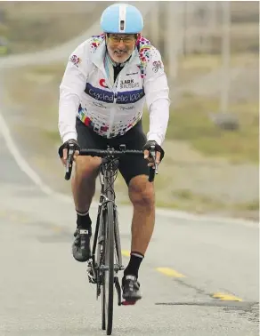  ??  ?? Edmonton lawyer Jan TerHart on a 305-km trip around Newfoundla­nd’s Avalon Peninsula, a ride he made with Sue Lambert. The pair are believed to be the first cyclists outside of Newfoundla­nders to make the trip.