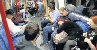  ??  ?? MIXED BLESSING?: It is hoped that the Night Tube will boost London’s night-time ecomony – though some passengers have expressed concern