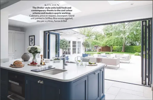  ??  ?? KITCHEN The Shaker-style units look fresh and contempora­ry thanks to the cool colour scheme and modern quartz worktop. Cabinetry, price on request, Davonport. Island unit painted in Stiffkey Blue estate eggshell, £60 per 2.5 litres, Farrow & Ball