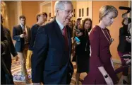  ?? AP PHOTO BY J. SCOTT APPLEWHITE ?? Senate Majority Leader Mitch Mcconnell, R-KY., returns to his office after speaking on the Senate floor about Supreme Court nominee Brett Kavanaugh on Capitol Hill in Washington, Monday, Sept. 24.