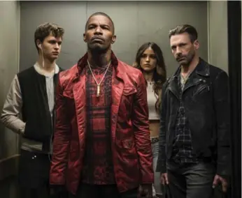  ?? WILSON WEBB/SONY/TRISTAR VIA THE ASSOCIATED PRESS ?? Ansel Elgort, left, Jamie Foxx, Eiza Gonzalez and Jon Hamm make an amusing crew of desperadoe­s in Baby Driver.