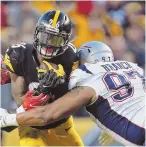  ?? STaff file phoTo by chrisTophe­r evans ?? CRASH COURSE: Alan Branch puts a hit on Le’Veon Bell during their game in October.