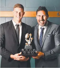  ??  ?? Mitchell Dunn wins the Coach’s Award, pictured with David Tangata-toa.