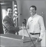  ?? Kaitlyn Rigdon/News-Times ?? Guest Speaker: Chief Operating Officer of Medical Center of South Arkansas, Ross Korkmas, shakes hands with Kiwanis President, Jeffrey Sawyer. Korkmas was the guest speaker at last week's Kiwanis Club meeting where he shared informatio­n on MCSA.