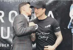  ??  ?? 0 Ricky Burns, right, and Anthony Crolla in Manchester yesterday.