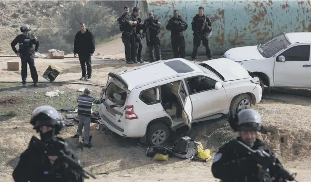  ?? PICTURE: MENAHEM KAHANA/GETTY IMAGES ?? 0 The vehicle in which an Arab Israeli man was shot dead after allegedly driving at and killing a police officer, sparking protests