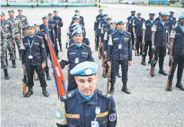  ??  ?? The Nepalese garrison stands at attention during the official closing ceremony of the United Nations Stabilisat­ion Mission in Haiti (MINUSTAH) in Tabarre, Haiti.