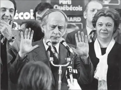  ?? CANADIAN PRESS FILE PHOTO ?? Quebec Premier René Lévesque tries to hush supporters at a Parti Québécois rally in Montreal, Nov. 15, 1976, following his party’s victory in the provincial election.