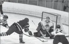  ?? CAROLE MORRIS-UNDERHILL ?? A Valley Maple Leafs’ player fires off a close range shot on goaltender Logan Cooke.