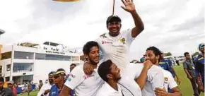  ?? REUTERS PIC ?? Sri Lanka’s Rangana Herath waves to fans bringing his Test career to an end yesterday.