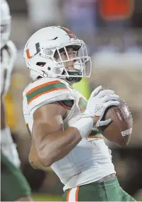  ?? AP PHOTO ?? STORMING TO VICTORY: Travis Homer celebrates his touchdown during No. 14 Miami’s 31-6 rout of Duke last night in Durham, N.C.