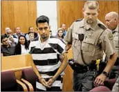  ?? JIM SLOSIAREK/AP ?? Cristhian Bahena Rivera is led into the courtroom for his initial court appearance Wednesday, in Montezuma, Iowa.