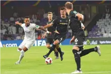  ?? Abdul Rahman/Gulf News ?? Caio of Al Ain and Mario Ilich of Wellington battle for possession at the Hazza Bin Zayed Stadium in Al Ain.