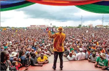  ?? PATRICK MEINHARDT/AFP ?? Kenya’s opposition leader Raila Odinga of the opposition National Super Alliance coalition delivers a speech to supporters in Kisumu, western Kenya, on Friday.