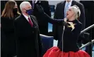  ??  ?? Lady Gaga sings the national anthem as Mike Pence looks on during the inaugurati­on of Joe Biden as president of the United States. Photograph: Brendan McDermid/Reuters