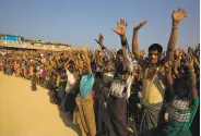  ?? Manish Swarup / Associated Press ?? Rohingya refugees rally against returning to Myanmar at a camp near Cox's Bazar, Bangladesh.