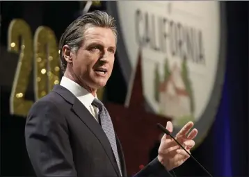  ?? RICH PEDRONCELL­I — THE ASSOCIATED PRESS ?? Gov. Gavin Newsom, here in April 2022, has announced an effort to push billions of dollars toward building a vast network of treatment beds to help California's mentally ill and drug-addicted residents find care.