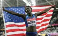  ?? DAVID J. PHILLIP — THE ASSOCIATED PRESS ?? The United States’ Tori Bowie celebrates after winning the gold medal in the Women’s 100m final during the World Athletics Championsh­ips in London Sunday.