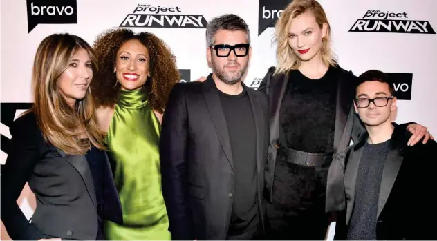  ?? Agencies ?? ↑ Top: Christian Siriano.Nina Garcia (left), Elaine Welteroth, Brandon Maxwell, Karlie Kloss and Christian Siriano attend Bravo’s “Project Runway” New York Premiere.