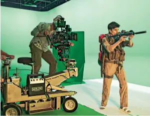  ?? Tig Notaro filming a scene for Army of the Dead on a green screen. ??