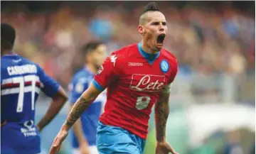  ??  ?? GENOA: Napoli’s midfielder Marek Hamsik from Slovakia celebrates after scoring during the Italian Serie A football match Sampdoria Vs Napoli on January 24, 2016 at ‘Luigi Ferraris Stadium’. — AFP