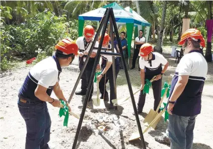  ?? FOTO FROM THE NGCP WEBSITE ?? POWER CONNECTION­S. Officials of the National Grid Corporatio­n of the Philippine­s break ground on the Mindanao-Visayas Interconne­ction Project. Aside from connecting the Mindanao and Visayas grids, the NGCP is also set to embark a project connecting the provinces of Cebu and Bohol next year.
