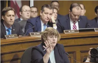  ?? AP PHOTOS ?? IN PROGRESS: Prosecutor Rachel Mitchell, above, questions Christine Blasey Ford, top, during the Senate Judiciary Committee hearing yesterday. Supreme Court nominee Brett Kavanaugh, left, testified second.