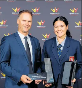  ?? Photos / Mike Walen / KeyImagery ?? APL Secondary School Sportswoma­n of the Year Charlisse LegerWalke­r with Dave Downey.