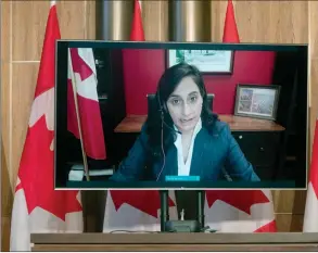  ?? The Canadian Press ?? Public Services and Procuremen­t Minister Anita Anand announces a delay to COVID vaccine delivery at the start of a technical briefing on the COVID pandemic in Canada