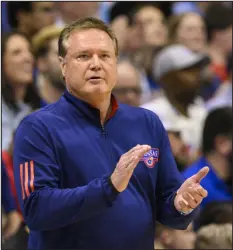  ?? REED HOFFMANN — THE ASSOCIATED PRESS ?? Kansas coach Bill Self applauds his team’s play against Texas Tech on Feb. 28 in Lawrence, Kan.