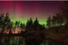  ?? Aldridge/Guardian Community ?? The aurora borealis at Burgie Arboretum in Forres, Moray. Photograph: Chris