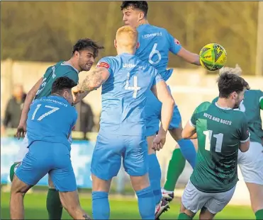  ?? Picture: Ian Scammell ?? Luke Burdon heads home Ashford’s equaliser against Hastings