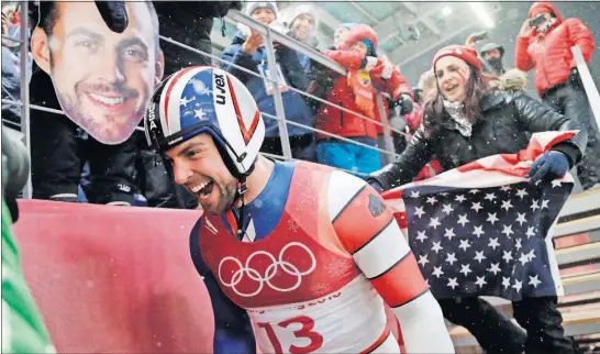  ?? [WONG MAYE-E/THE ASSOCIATED PRESS] ?? Chris Mazdzer of the United States feels the thrill after completing his silver-medal run in men’s singles luge.