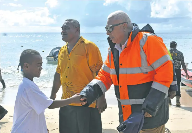  ?? Photo: Laisa Lui ?? Children of Kia Island eagerly greeted Prime Minister Voreqe Bainimaram­a on January 15,2021.