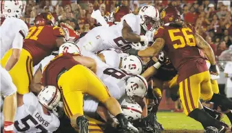  ?? Robert Gauthier / Los Angeles Times ?? Stanford’s offensive line was excellent against USC, opening a hole for Remound Wright’s TD.