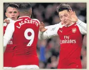  ??  ?? BIG GUNS Lacazette and Ozil could face Chelsea