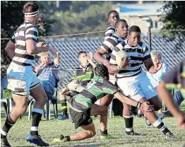 Queen’s withstand Hudson pressure to win school clash - PressReader