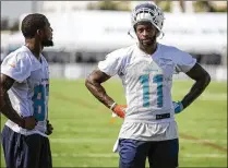  ?? ALLEN EYESTONE / THE PALM BEACH POST ?? Dolphins wide receiver DeVante Parker (11) has not been practicing and is considered doubtful for Sunday’s opener against the Titans at Hard Rock Stadium.