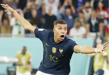  ?? ?? France’s Kylian Mbappe celebrates after scoring a goal against Denmark during their World Cup match.